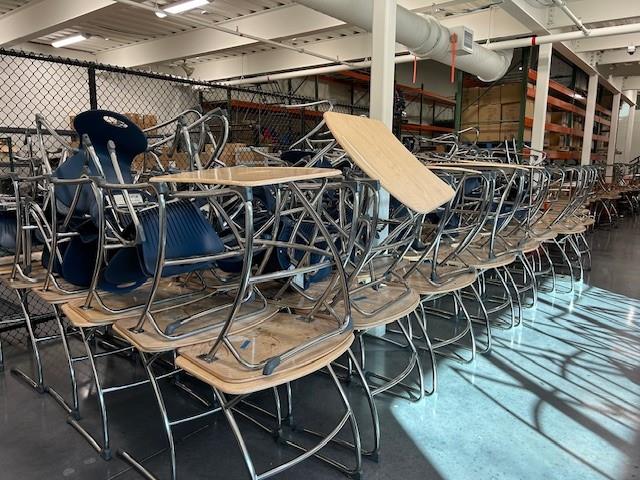 Desks piled up